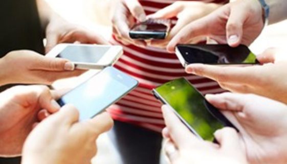 holdingCellPhones