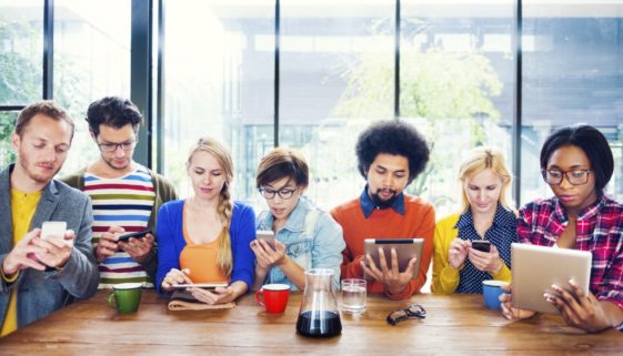 Group of people using mobile devices