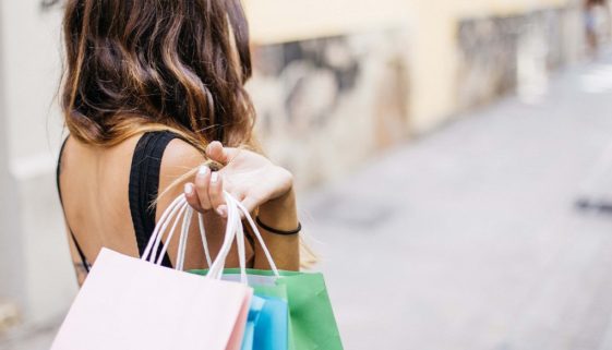 blu-girl-with-shopping-bags