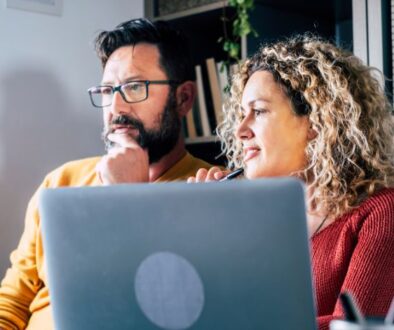 the-blu-group-advertising-&-marketing-refresh-your-website-for-the-new-year-2026-two-workers-looking-at-computer