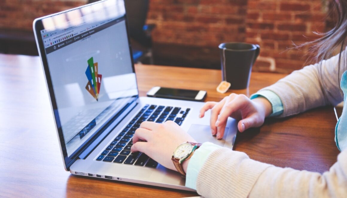 Marketing professional reviewing a business logo as part of a brand strategy.