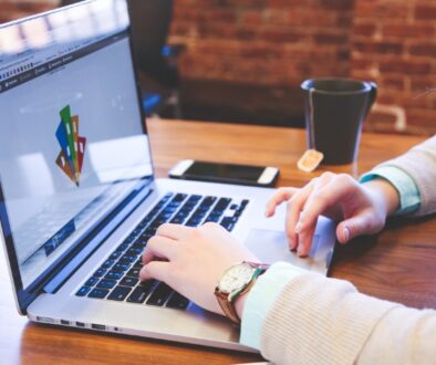 Marketing professional reviewing a business logo as part of a brand strategy.