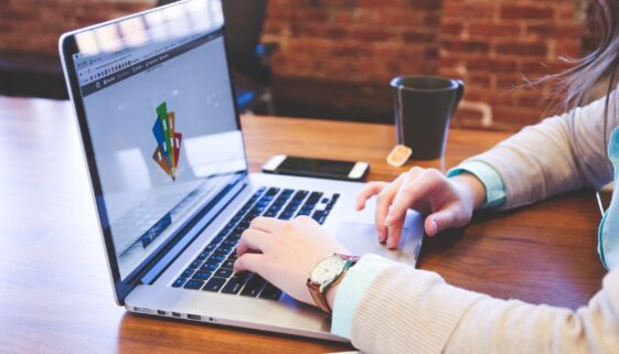 Marketing professional reviewing a business logo as part of a brand strategy.